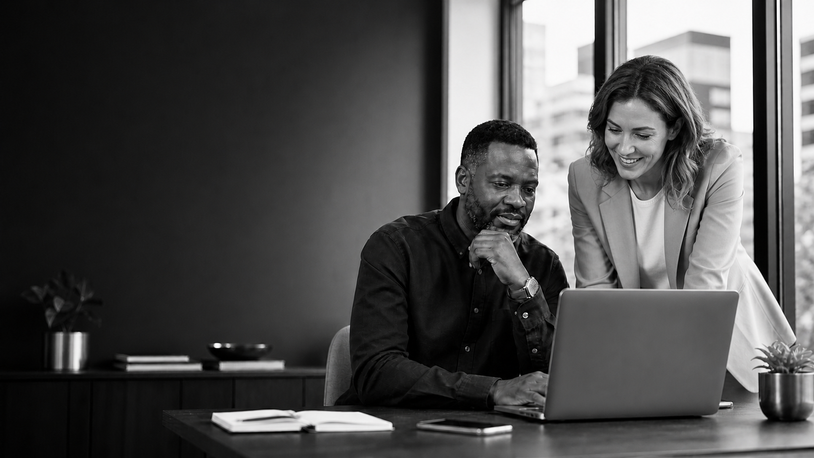 Business professionals collaborating on practical AI services